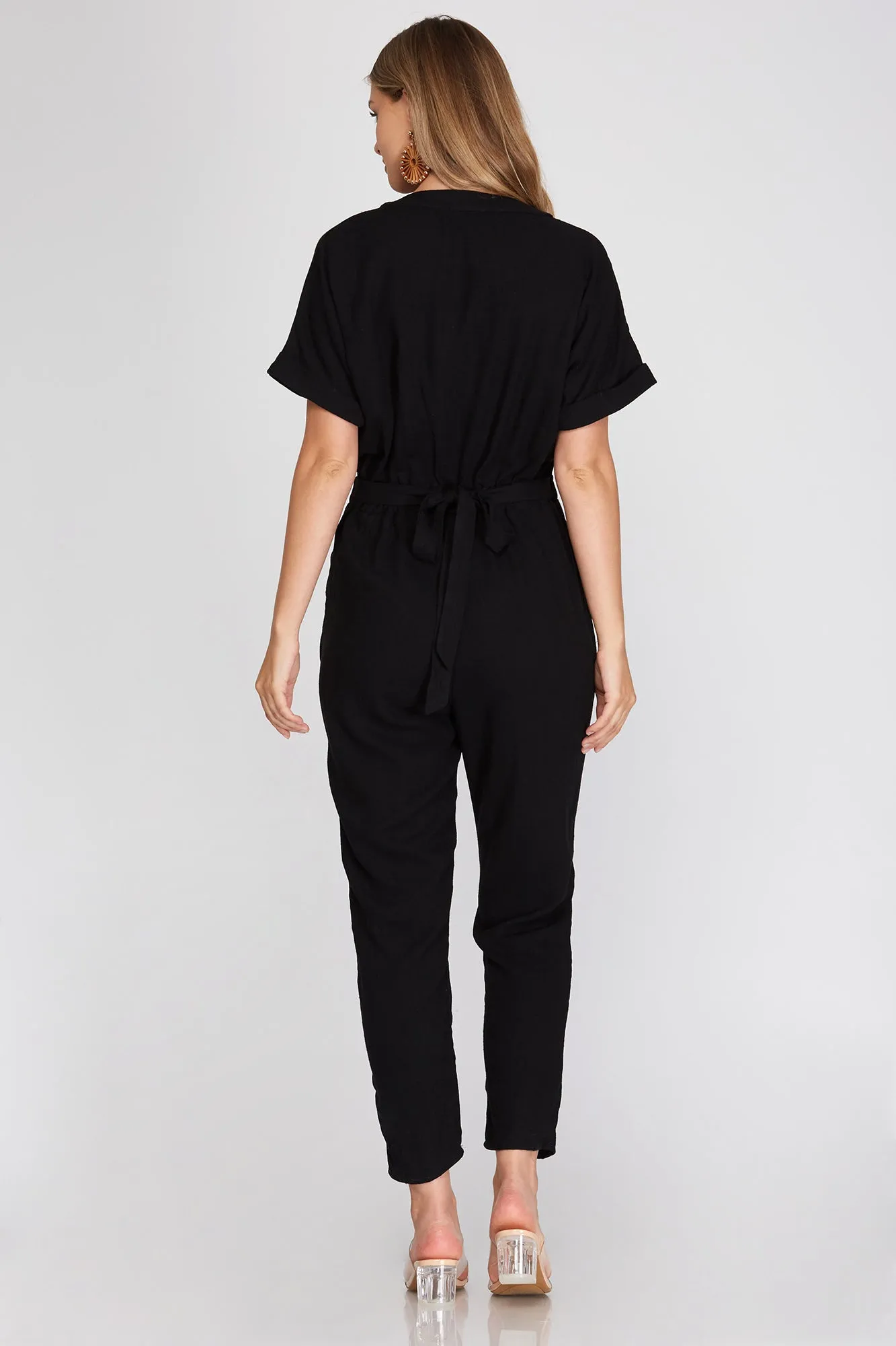 BLACK SHORT SLEEVE WOVEN V NECK JUMPSUIT WITH WAIST TIE